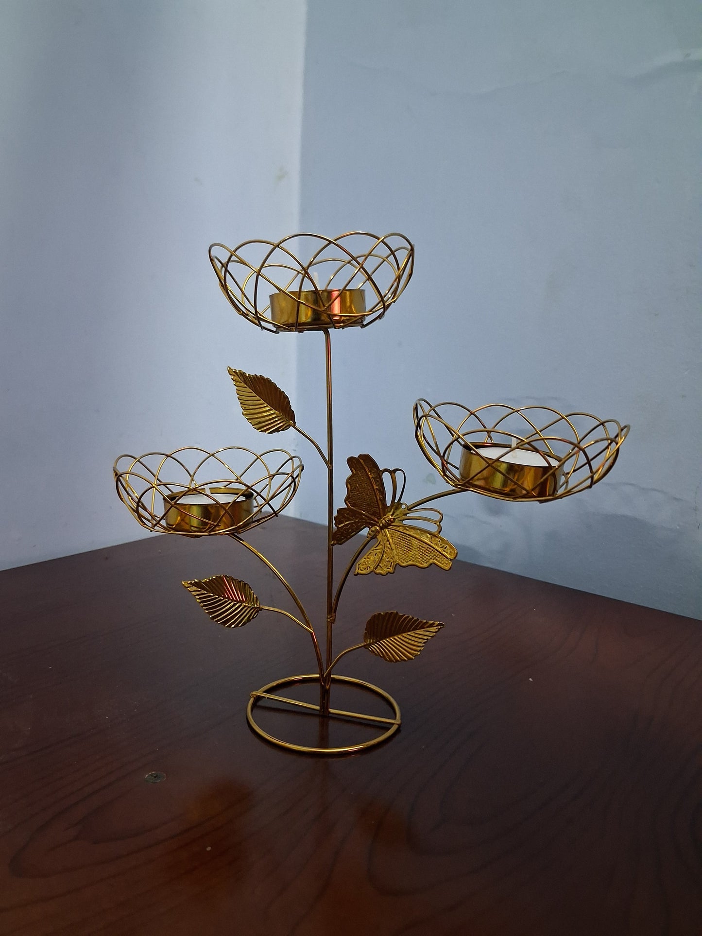 Beautiful golden butterfly light holder