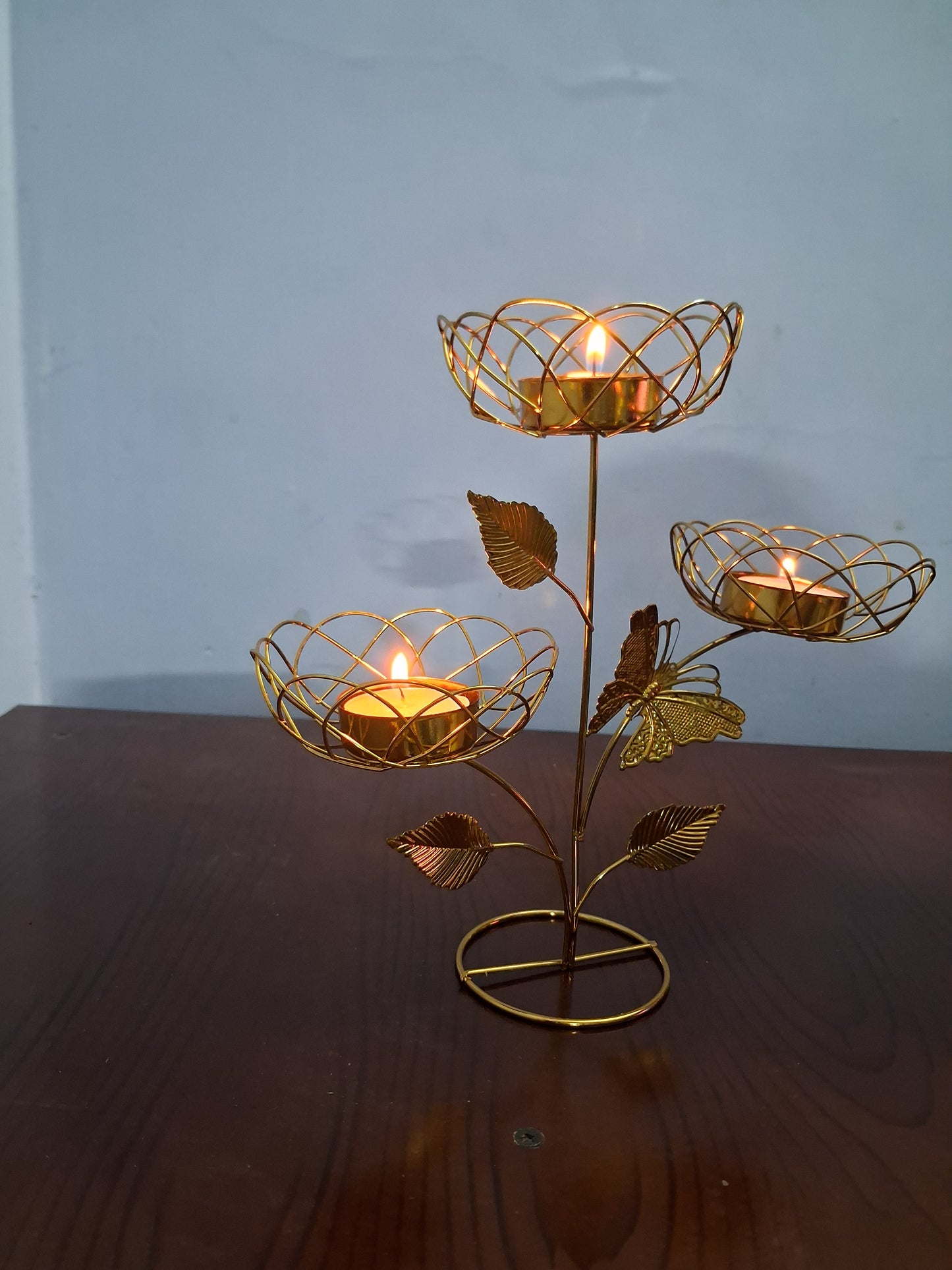 Beautiful golden butterfly light holder