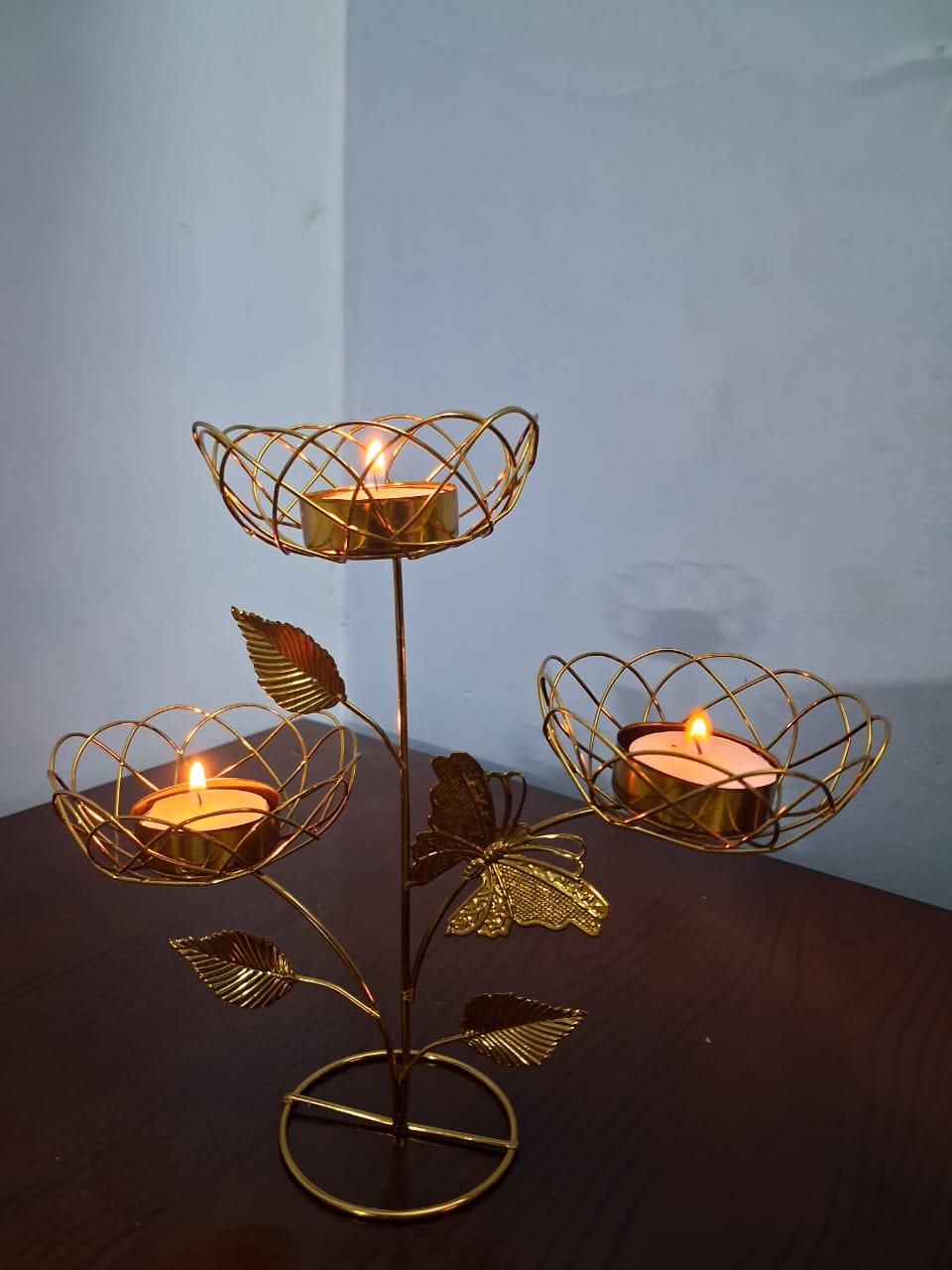 Beautiful golden butterfly light holder