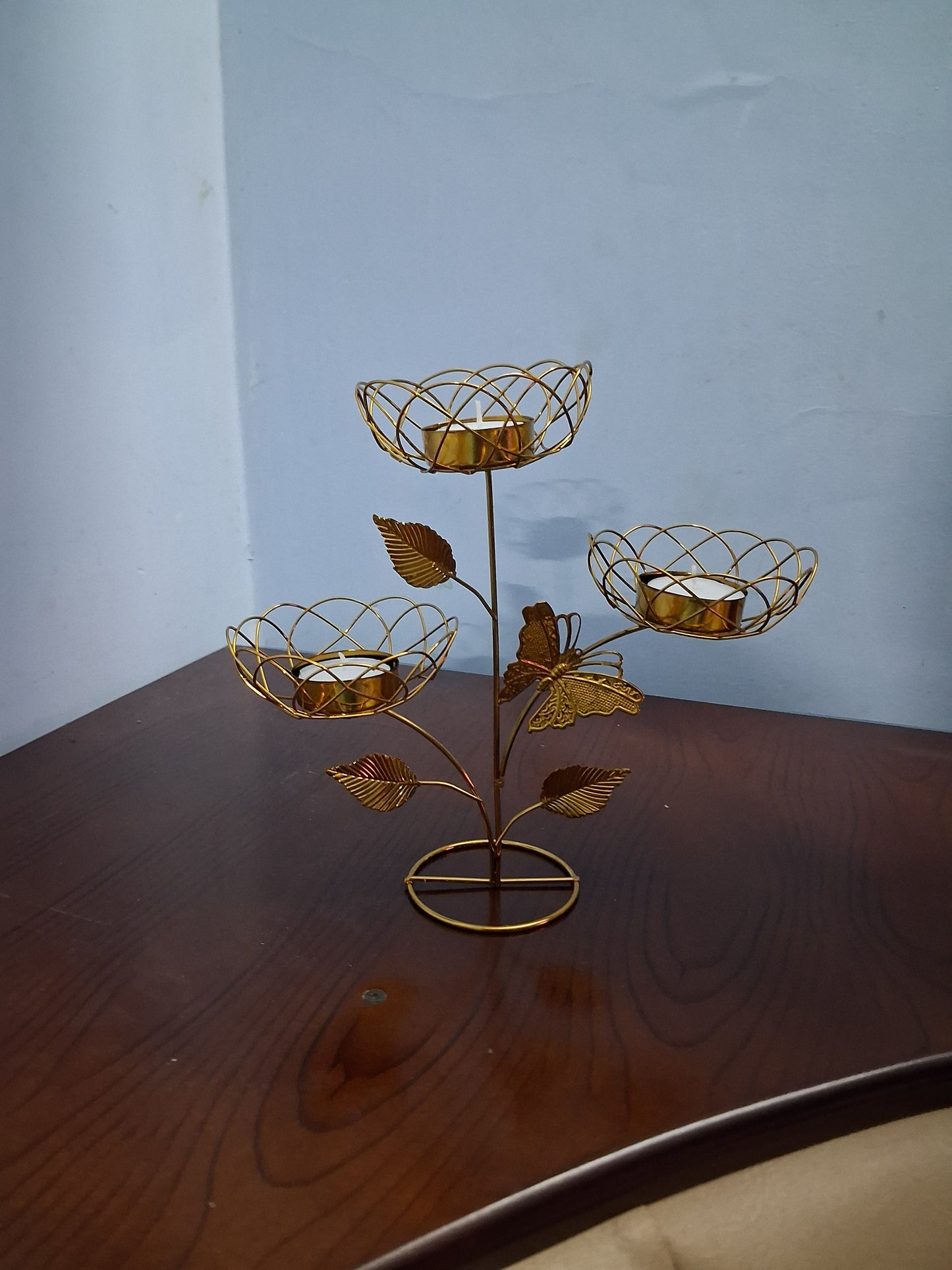 Beautiful golden butterfly light holder